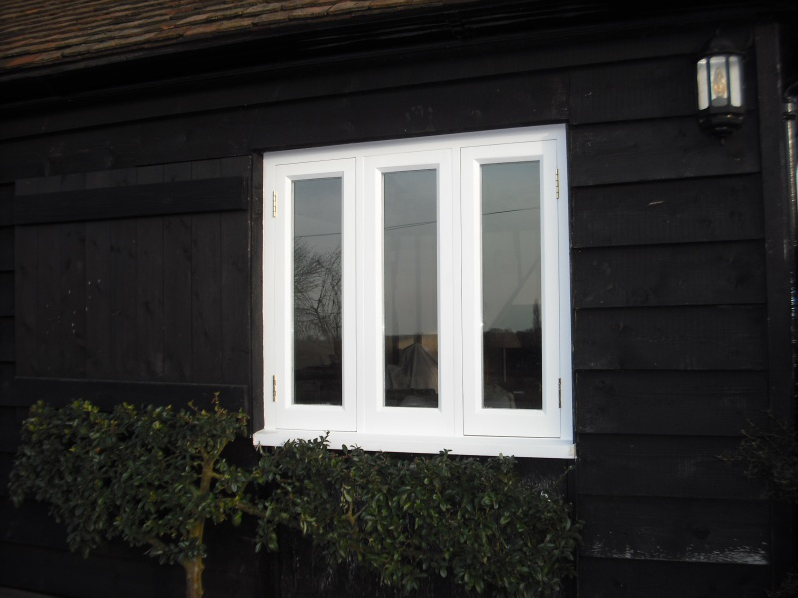 bespoke white casement window in barn conversion