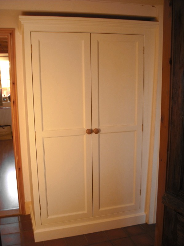 Bespoke tall kitchen cupboard in white